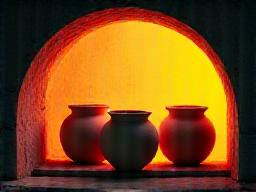 Ceramic pots inside a hot kiln